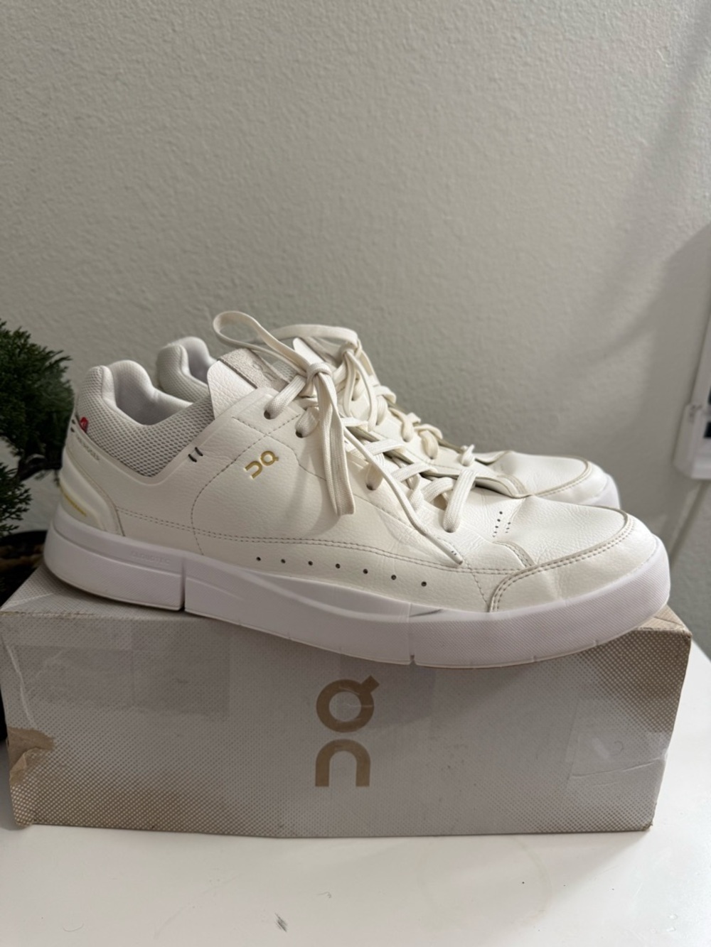 On Running men size 13White Mesh Athletic Sneakers with Gold Logo